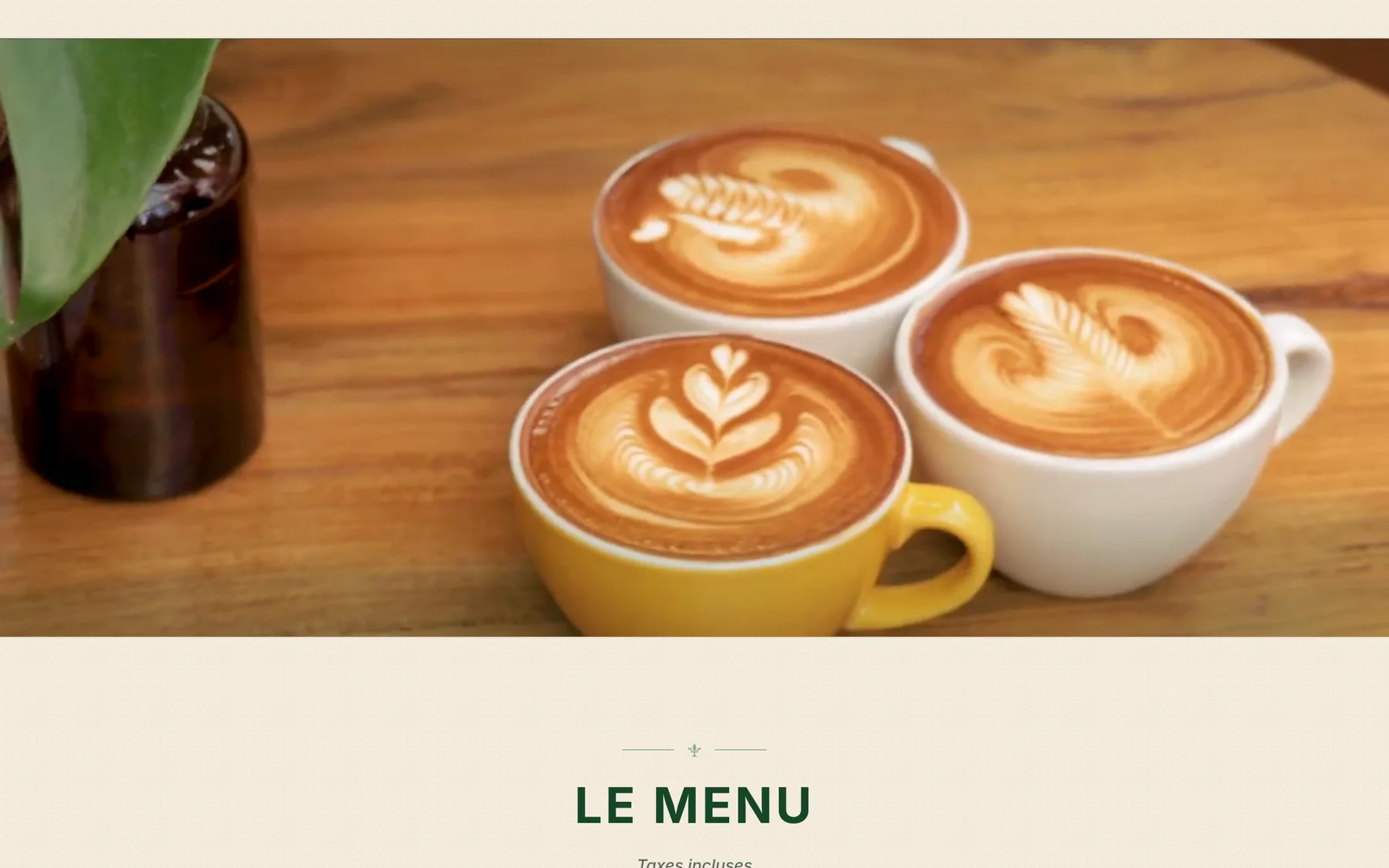 Website video loop of lattes on a wooden table